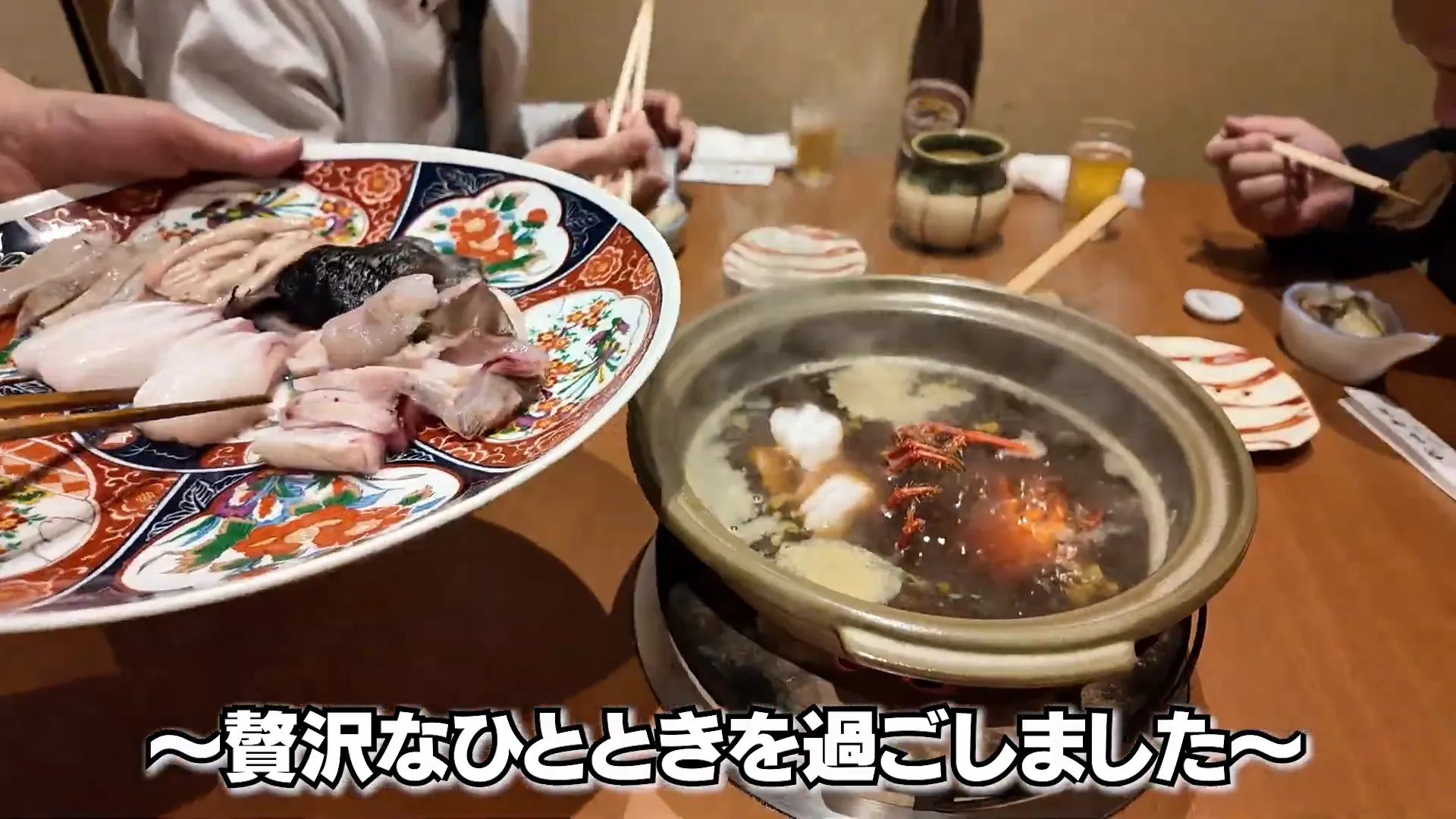 お祝い会で牡蠣を楽しむ様子